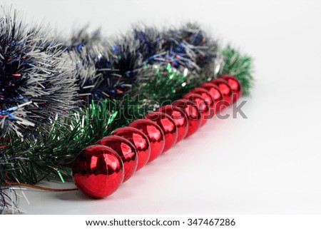 Christmas decorations made from jewelry and toys on a white background

