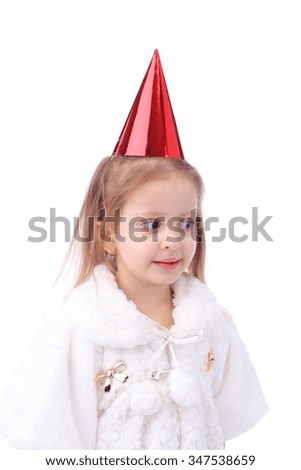 cute little girl wearing the birthday cap
