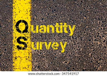Concept image of Accounting Business Acronym QS Quantity Survey written over road marking yellow paint line.