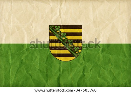Saxony flag pattern on paper texture,retro vintage style