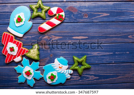 christmas cookies on blue texture background