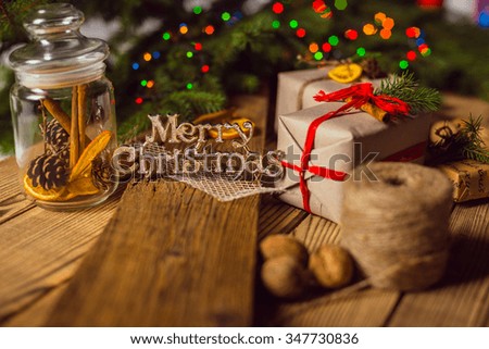 Merry Christmas! Accessories for celebrating Christmas on a wooden table