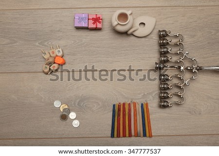 Jewish holiday Hanukkah celebration.
 Set of organized objects on white background.. View from above