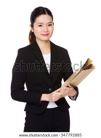 Asian Young Businesswoman hold with folder