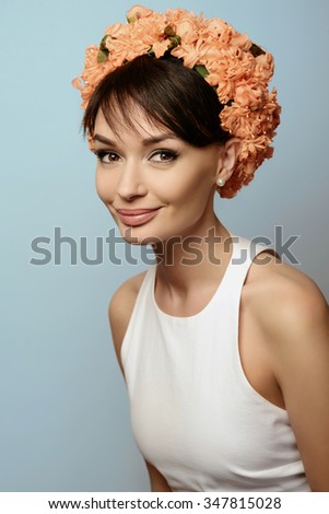 Young beautiful girl in the flower crown