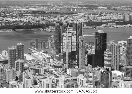 New York City Manhattan skyline aerial view black and white with skyscrapers and Hudson.