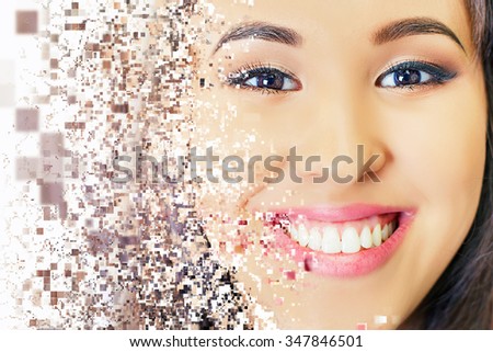 Beautiful asian woman smile with healthy teeth whitening. effect of pixelated decomposition. Dental care concept. Implants. White