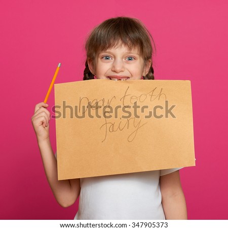 lost tooth girl portrait, studio shoot on pink background