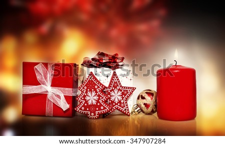 Christmas decoration and gift box on bokeh background