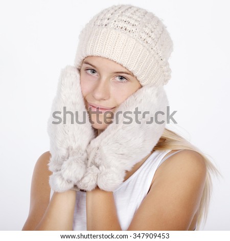 photo of beautiful girl in winter clothes