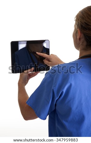 lab technician holding a tablet portrait