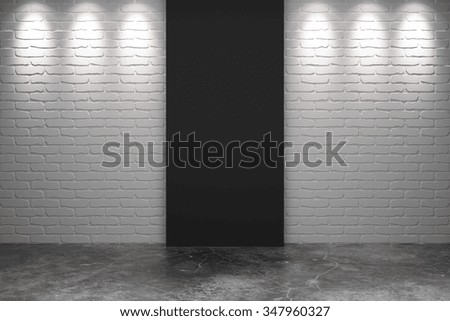 Black part of white brick wall with concrete floor in empty room