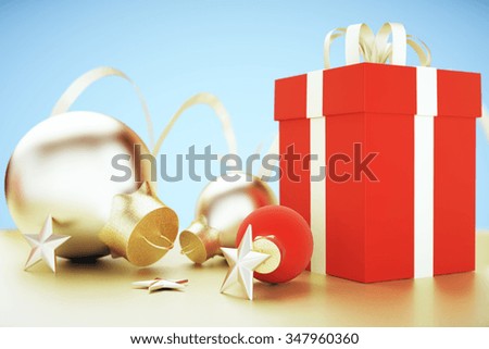 Christmas tree toys - red and golden balls and red gift box at blue background