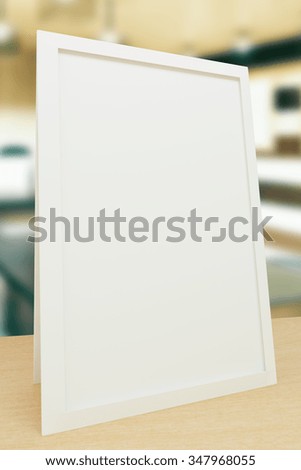 Blank picture frame on the table, mock up