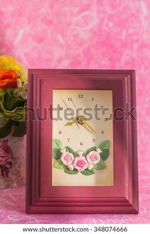 Photo Frame Clock on a pink background