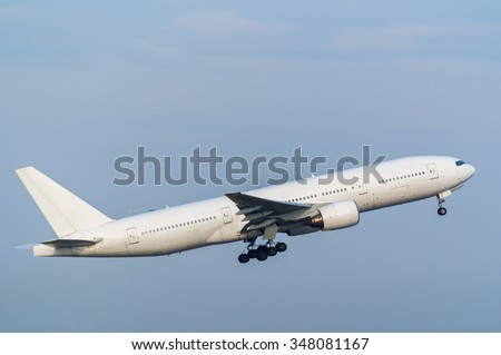 Airplane taking off from the airport. Royalty-Free Stock Photo #348081167