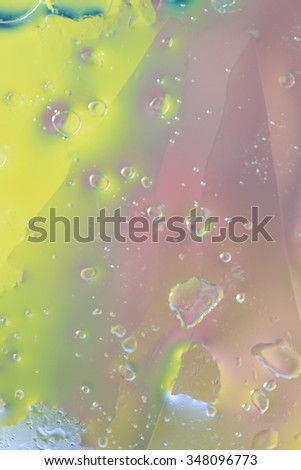 Background of water and oil drops on glass 