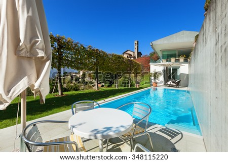 Modern house, beautiful patio with pool