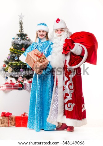 Santa Claus with smiled woman on white background. Isolated