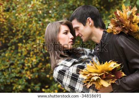 lovely couple in autumn park
