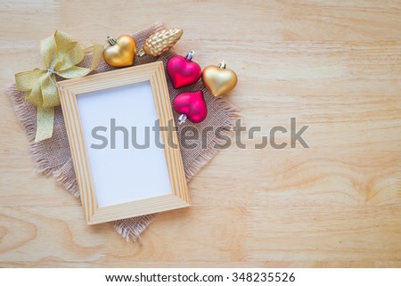 Happy New Year background decoration and photo frame over wooden table, Happy New Year concept