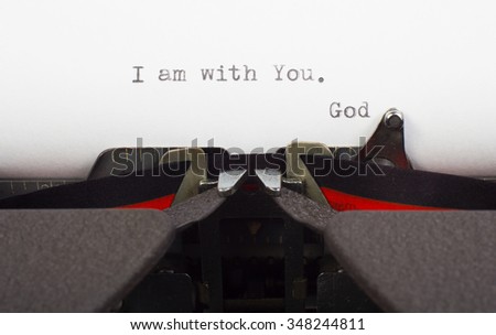 "I am with You" written on typewriter