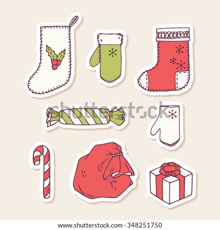Set of hand drawn christmas stickers. Doodle holiday decorative clip art. Vector illustration