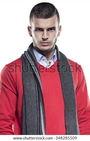 The man in scarf and red sweater