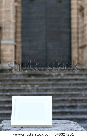White photo frame with the background scenery and streets