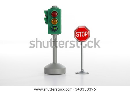 Traffic light and stop road sign on white 
