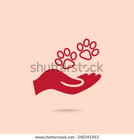 Shelter pets sign icon. Hand holds paw symbol. Animal protection