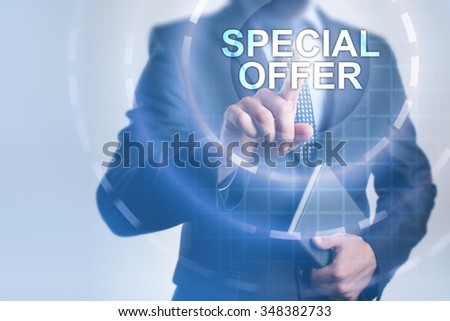 Businessman pressing button on touch screen interface and select Special offer. Business, internet, technology concept.