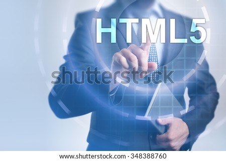 Businessman pointing on virtual screen and select HTML5. Business concept. Internet concept.