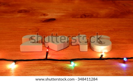 Christmas background with lights on the table