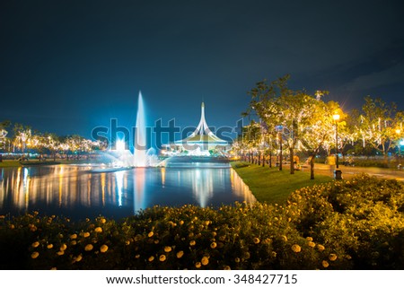 Fireworks for the Thailand King birthday show in the park with nice fountain and flower.