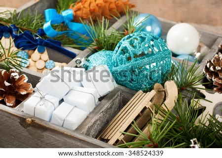 Christmas decoration with christmas tree branches in wooden box. Holidays concept. 