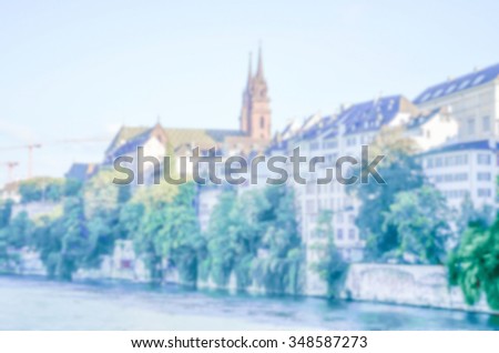 Defocused background with cityscape of Basel, Switzerland. Intentionally blurred post production for bokeh effect
