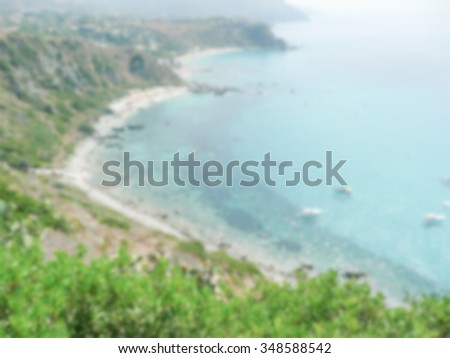 Defocused background with Aerial View of the Coastline at Capo Vaticano, Italy. Intentionally blurred post production for bokeh effect