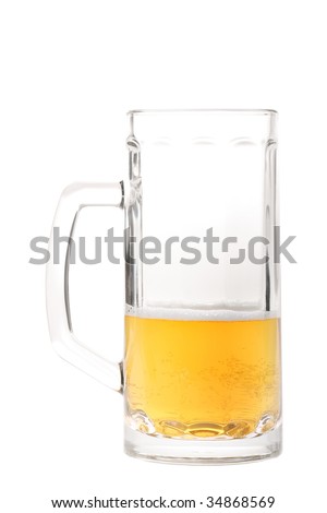 Half-drank beer mug with a big handle isolated on white