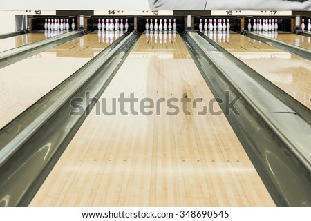 Close up of bowling pins in a row