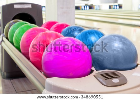 Close-up view of colorful bowling balls