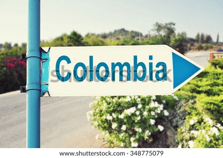 Colombia Road Sign with beautiful nature and road on background
