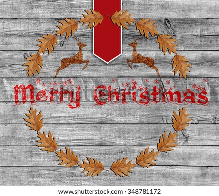 Red Merry Christmas on wooden background