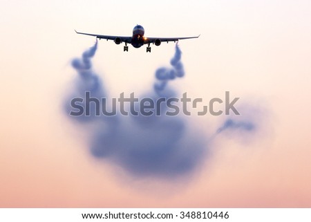 Turbulent wake visualizing behind airplane. Royalty-Free Stock Photo #348810446