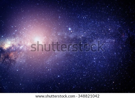 blurred image of pink stars in the galaxy. Some elements of this image furnished by NASA