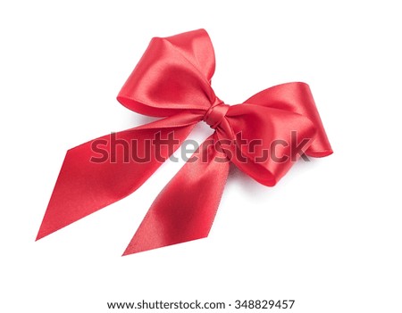 Celebratory red bow on a white background.