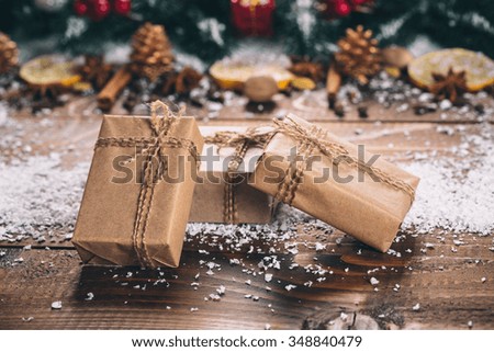 Beautiful Christmas wooden background with snow fir tree. View with copy space