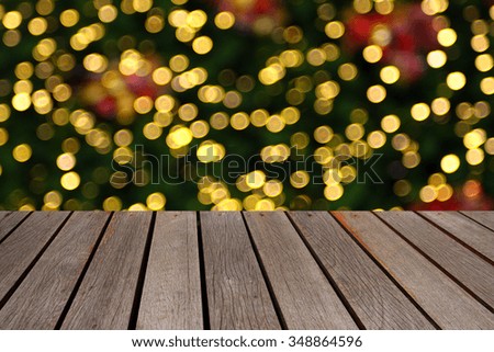 Wooden table and  abstract blurred bokeh background,Light from LED light