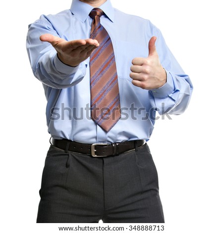 Unrecognizable businessman showing empty hand and thumb up