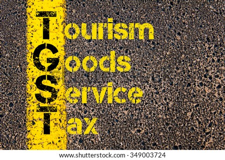 Concept image of Accounting Business Acronym TGST Tourism Goods and Service Tax written over road marking yellow paint line.